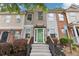 Inviting townhome with a well-kept lawn, colorful front door, and a cozy curb appeal at 2864 Vining Ridge Ter, Decatur, GA 30034