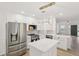 Modern kitchen featuring stainless steel appliances, an island, and an open layout at 2864 Vining Ridge Ter, Decatur, GA 30034