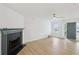 Bright living room with a fireplace, hardwood floors, and neutral paint at 2864 Vining Ridge Ter, Decatur, GA 30034