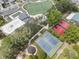 An aerial view shows the splash pad, soccer field, basketball court, and tennis courts at 3253 Cates Ne Ave, Brookhaven, GA 30319