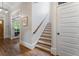 Hallway with hardwood floors and stairway to the second floor at 3253 Cates Ne Ave, Brookhaven, GA 30319