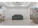 Comfortable living room provides a welcoming atmosphere with neutral tones, fan and ample natural light at 3253 Cates Ne Ave, Brookhaven, GA 30319