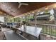 Cozy screened-in porch with ceiling fan, lights and ample seating area at 3253 Cates Ne Ave, Brookhaven, GA 30319
