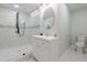 This bathroom has a glass shower, white vanity, lighting, and toilet at 3349 Old Atlanta Rd, Suwanee, GA 30024