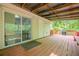 Deck with outdoor dining area overlooking the backyard at 3349 Old Atlanta Rd, Suwanee, GA 30024