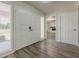 Foyer with a double door entry and vinyl plank flooring at 3349 Old Atlanta Rd, Suwanee, GA 30024