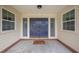 Welcoming front porch with double doors, sidelight windows, and a 'Georgia' welcome mat at 3349 Old Atlanta Rd, Suwanee, GA 30024