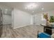 Living room with vinyl plank flooring at 3349 Old Atlanta Rd, Suwanee, GA 30024