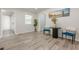 Open concept living room, vinyl plank flooring, and abundant natural light at 3349 Old Atlanta Rd, Suwanee, GA 30024