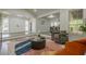 Spacious living room with hardwood floors, recessed lighting, and an open concept design at 3349 Old Atlanta Rd, Suwanee, GA 30024