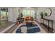 Comfortable living room featuring large windows, hardwood floors, and stylish decor at 3349 Old Atlanta Rd, Suwanee, GA 30024