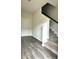 Inviting entryway with hardwood floors and a staircase leading to the upper level at 3658 Hidden Valley Cir, Lawrenceville, GA 30044