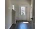 Inviting entryway with hardwood floors and a staircase leading to the upper level at 3658 Hidden Valley Cir, Lawrenceville, GA 30044
