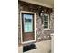 Close-up of front door, address, and cozy porch featuring brick facade and classic design at 3658 Hidden Valley Cir, Lawrenceville, GA 30044