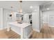 Updated kitchen with a large island and modern appliances at 2128 Hosea L Williams Ne Dr, Atlanta, GA 30317