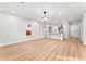 Open-concept living room connected to the kitchen featuring hardwood floors and recessed lighting at 2128 Hosea L Williams Ne Dr, Atlanta, GA 30317