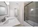 Clean bathroom with a tile shower, quartz countertop, and modern fixtures at 2340 Cresta Dr, Decatur, GA 30032