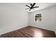 This bedroom has a large window and hardwood floors at 2340 Cresta Dr, Decatur, GA 30032