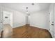 Well-lit living space featuring freshly painted walls and rich hardwood flooring at 2340 Cresta Dr, Decatur, GA 30032