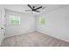 An airy room with a ceiling fan and window at 3717 Birchbriar Ct, Decatur, GA 30034
