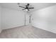 Neutral carpet in an airy room with a ceiling fan at 3717 Birchbriar Ct, Decatur, GA 30034