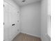 This closet features double doors and neutral carpet at 3717 Birchbriar Ct, Decatur, GA 30034