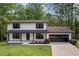 Charming two-story home with a freshly painted exterior and a well-maintained front yard at 3717 Birchbriar Ct, Decatur, GA 30034