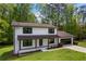 Charming two-story home with a lush green lawn and inviting curb appeal at 3717 Birchbriar Ct, Decatur, GA 30034