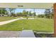 View of the front yard from the covered porch, showcasing a lush green lawn and surrounding landscape at 3717 Birchbriar Ct, Decatur, GA 30034