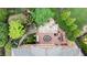 Overhead view of a deck, patio, and landscaped yard featuring lush greenery and outdoor seating at 4231 Shamans Dr, Marietta, GA 30062