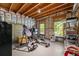Unfinished basement featuring wood framing, exposed insulation, and two windows at 4231 Shamans Dr, Marietta, GA 30062