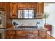 Close up view of gourmet kitchen features wood cabinets, granite counters, and stainless steel appliances at 4231 Shamans Dr, Marietta, GA 30062