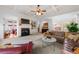 Spacious living room with coffered ceilings, fireplace, and built-in bookshelves at 4231 Shamans Dr, Marietta, GA 30062