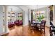 Inviting living room with large windows, dining area, hardwood floors, and plenty of natural light at 4231 Shamans Dr, Marietta, GA 30062