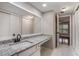 Bathroom vanity features a sink with granite countertops, offering style and functionality at 122 Maison Nw Pl, Atlanta, GA 30327