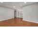 Bright living room featuring wood floors and neutral paint, providing a modern and inviting space at 122 Maison Nw Pl, Atlanta, GA 30327
