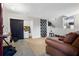 Finished basement with painted walls and ceiling with curtains, and seating area at 1496 S Hairston Rd, Stone Mountain, GA 30088