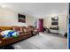 Spacious basement with brick-painted walls, windows, and access door to outside at 1496 S Hairston Rd, Stone Mountain, GA 30088