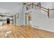 Spacious living room flows to an open-concept kitchen with granite countertops and stainless steel appliances at 2455 Kirkstone Dr, Buford, GA 30519