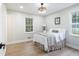 Cozy bedroom with ample natural light and neutral decor creating a serene and welcoming atmosphere at 354 Tarragon Sw Way, Atlanta, GA 30331