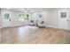 Bright and airy living room with sleek flooring and ample natural light at 354 Tarragon Sw Way, Atlanta, GA 30331
