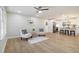 Bright living room with sleek flooring open to a modern kitchen with a center island at 354 Tarragon Sw Way, Atlanta, GA 30331