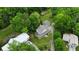 Stunning aerial view of the home showcasing lush greenery and a serene setting at 3884 Vic Ar Ct, Peachtree Corners, GA 30360