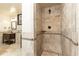 Close-up of the fully tiled shower in this well-appointed bathroom at 3884 Vic Ar Ct, Peachtree Corners, GA 30360