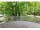 Wooden deck featuring lush green landscaping at 3884 Vic Ar Ct, Peachtree Corners, GA 30360