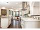 Bright, modern kitchen with stainless steel appliances, granite countertops, and decorative backsplash at 3884 Vic Ar Ct, Peachtree Corners, GA 30360