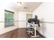Office space with hardwood floors, a window, and wainscoting at 3884 Vic Ar Ct, Peachtree Corners, GA 30360