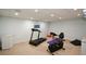 Basement with treadmill, exercise bike and other fitness equipment at 132 Picketts Creek Dr, Acworth, GA 30101