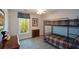 Bedroom with a bunk bed, soft carpet and a wooded view at 132 Picketts Creek Dr, Acworth, GA 30101
