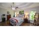Comfortable bedroom boasts tray ceilings, wood floors and ample natural light at 132 Picketts Creek Dr, Acworth, GA 30101